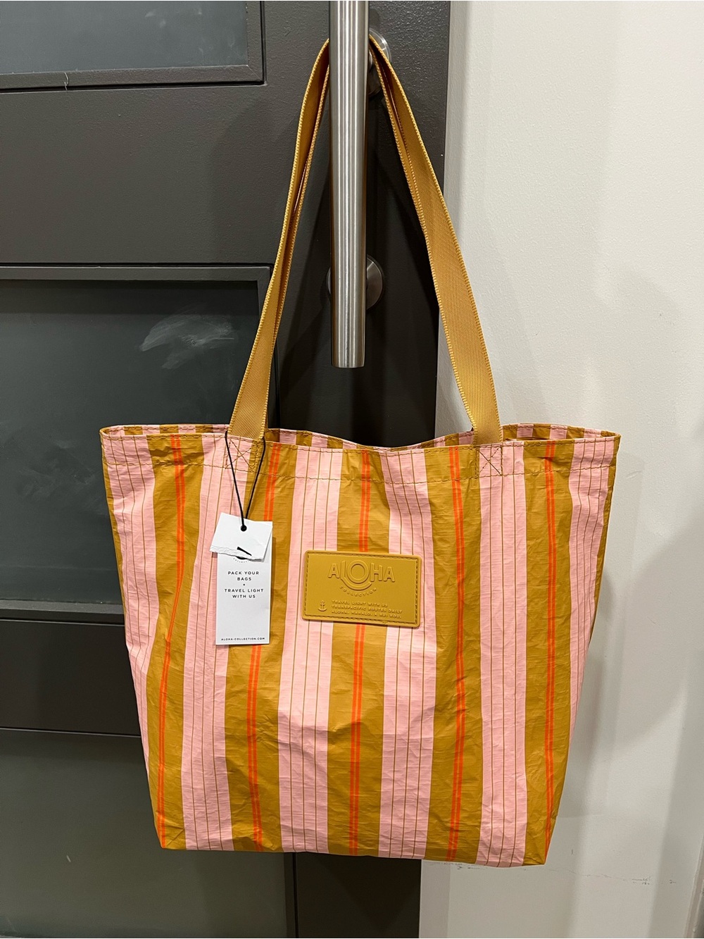 Aloha Collection Splash-Proof Pink and Mustard Checkerboard Reversible Tote Bag - Picture 3 of 3